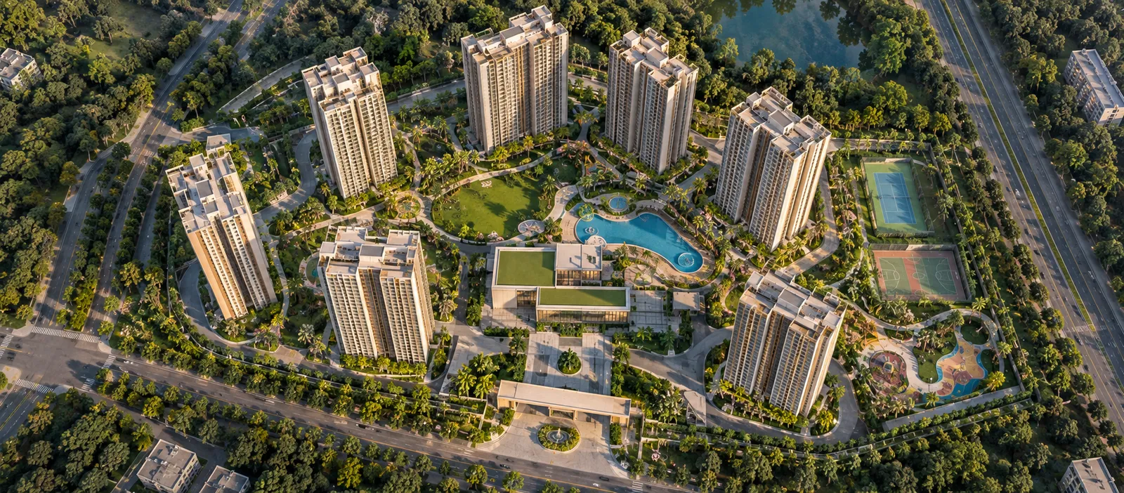 Daytime view of a landscaped plaza fronting the clubhouse at Sobha Amara